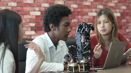 Multiracial students learning robotics, biometric and chemicals in laboratory. Architects student learning ideas, design technology and collaborating development robot. self learning. - Powered by Adobe