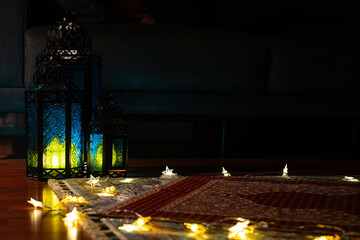 Woman Praying on a Prayer Mat on the Background of Ramadan Lanterns, Uskudar Istanbul, Turkiye (Turkey)
