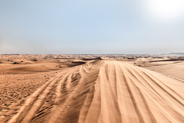 Fototapeta na wymiar The majestic splendor of the vast sandy desert near Dubai city, United Arab Emirates