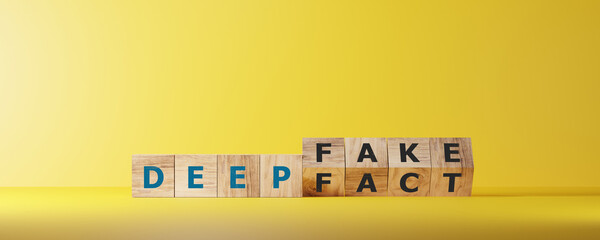Dice form the words DEEPFAKE on wooden cube block. Deepfake concept matching facial movements.
