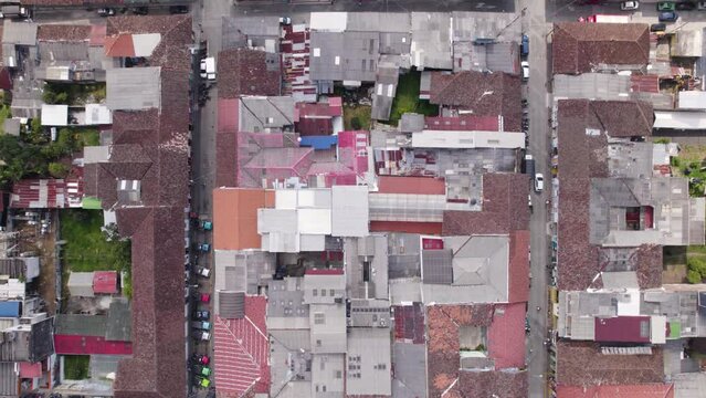 Top down aerial view of houses, rooftops in small town Filandia, Colombia