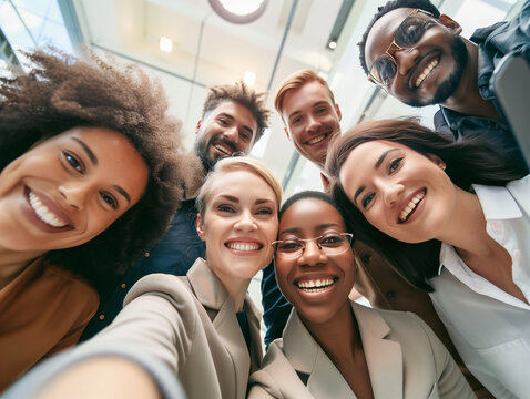 Multicultural happy people taking group selfie portrait in the office, diverse people celebrating together, Happy lifestyle, start-up and teamwork concept
