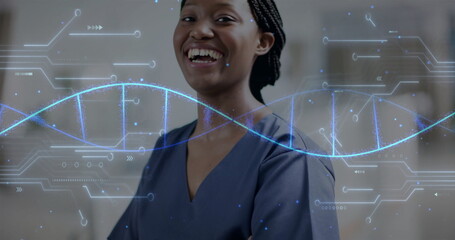 Image of dna strand and data processing over african american female doctor in hospital