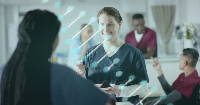 Image of dna strand and data processing over diverse doctors in hospital