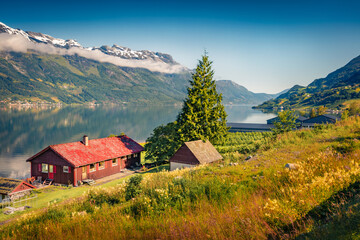 Exciting summer view of Lofthus village in Ullensvang municipality which is located in the...