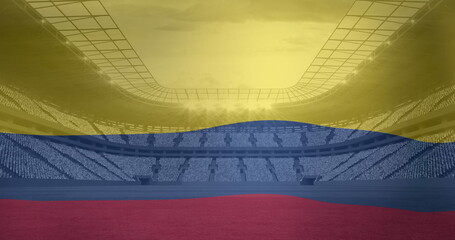 Image of flag of colombia over sports stadium