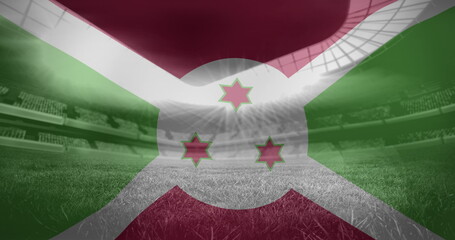 Image of flag of burundi over sports stadium