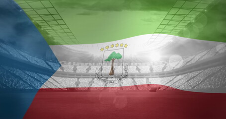 Image of flag of guinea over sports stadium