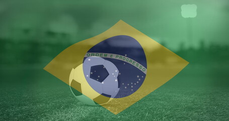 Image of flag of brazil over football on stadium