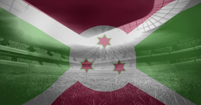 Naklejki Image of flag of burundi over sports stadium