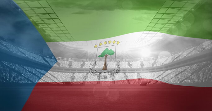 Naklejki Image of flag of guinea over sports stadium