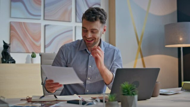 Happy creator videocalling laptop having virtual conference at office closeup