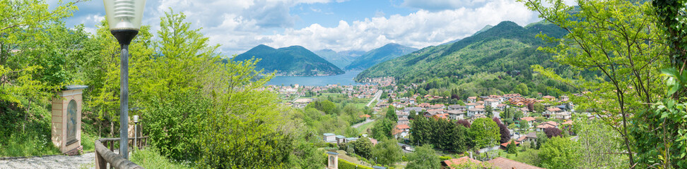 Lugano lake and the towns of Besano and Porto Ceresio. In the background Vico Morcote and Campione...