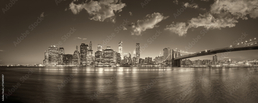 Sticker New York City night lights. Lower Manhattan and Brooklyn Bridge panorama from Brooklyn Bridge Park