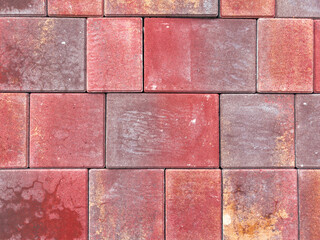 Red paving slabs as an abstract background. Texture