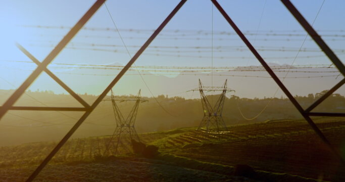 Fototapeta Image of countryside landscape with power lines