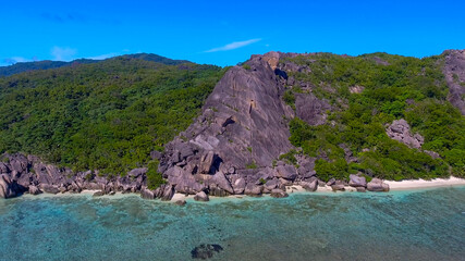 Anse Source D'Argent Beach in La Digue, Seychelles. Aerial view of tropical coastline on a sunny day - 756985031