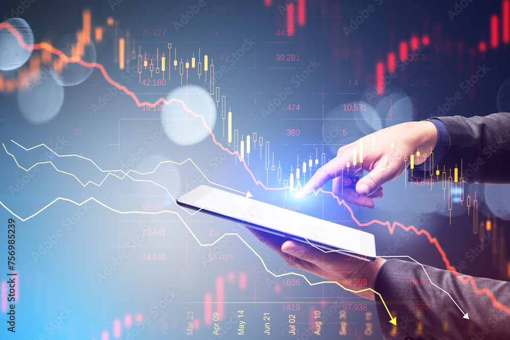Poster close up of male hand holding and using smartphone with abstract downward red forex chart on blurry 