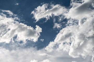 An abstract view of Cumulonimbus clouds appear on the sky.