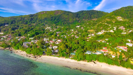 Mahe Beach, Seychelles. Aerial view of tropical coastline on a sunny day - 756986440