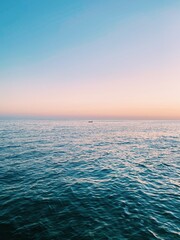 Tranquil Solitude: Lone Boat at Sunset