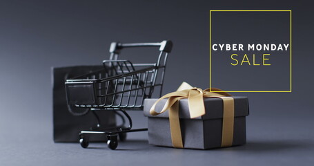 Image of cyber monday sale text over shopping trolley and gifts