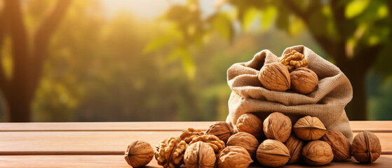 A bag of walnuts with nature background on wooden mat