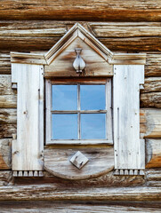 Window in an old wooden village house
