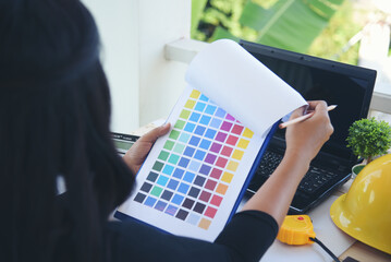 Woman engineer hands working at office desk architecture. Women engineer hands drawing architect blueprint write paperwork table office supply. Engineering calculate measurement construction hardhat