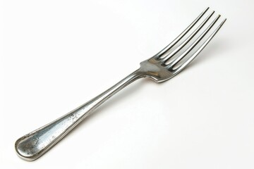 Single fork on white background