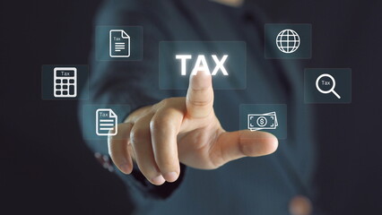 Businessman show TAX for Individual income tax return form online for tax payment concept. Government, state taxes. Data analysis, paperwork, financial research, report. Calculation tax return.