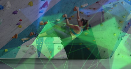 Image of data processing over caucasian woman climbing wall