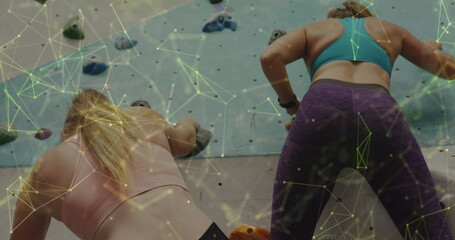 Image of data processing with connections over caucasian women climbing wall