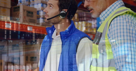 Close up of two Caucasian male warehouse workers discussing in front of a laptop