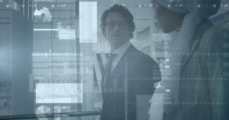 Image of data processing over diverse business people walking in office