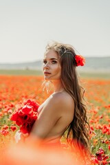 Woman poppies field. portrait happy woman with long hair in a poppy field and enjoying the beauty...