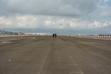 Aircraft runway of an airport with the number three
