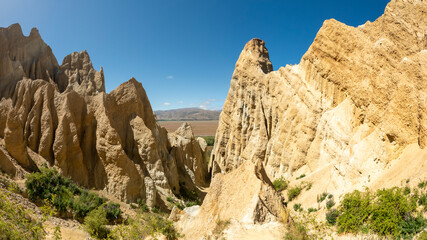 Omarama Clay Cliffs : unique and dramatic landscape with pinnacles, ravines, and sharp ridges in...