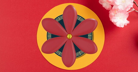 Image of chinese pattern and flowers with copy space on red background