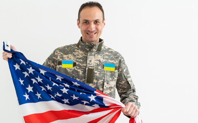 Ukrainian military man with USA flag