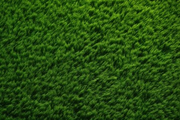 Artificial green grass used for sports stadiums and decorations providing a textured background - obrazy, fototapety, plakaty