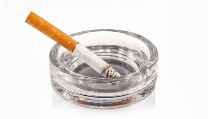 Cigarettes placed in a glass ashtray