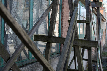 Old wooden scaffolding against the wall