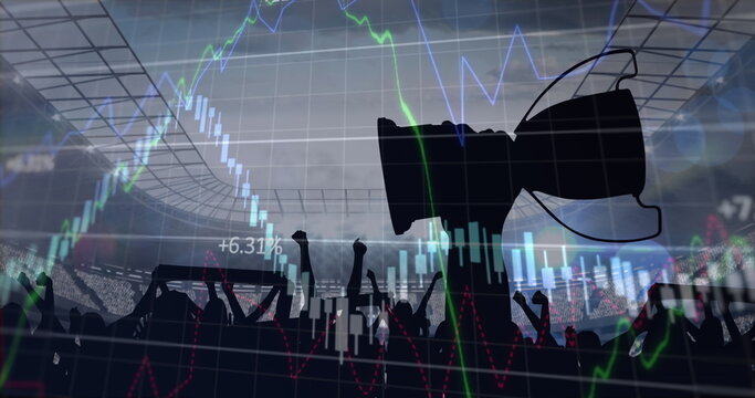 Image of data processing on line graphs over trophy and cheering sports fans in stadium