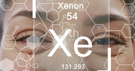 Image of elements and molecular strcutures over eyes of smiling biracial female doctor - Powered by Adobe