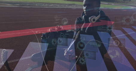 Image of statistics with arrow over disabled male athlete with running blades on racing track