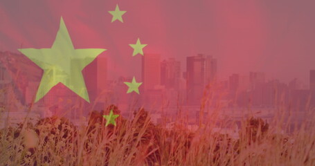Image of flag of china over cityscape