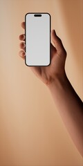 A hand holding smartphone with a blank display against a smooth beige background - 757036449