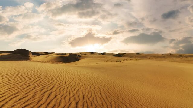 Timelapse of dramatic sunset over the sand dunes in the desert. Namib desert.