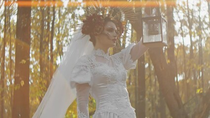 Enchanted forest wedding theme with model in elaborate bridal gown and unique headpiece. Artistic makeup and fantasy styling for an ethereal bridal look. Perfect for editorial, costume design, and